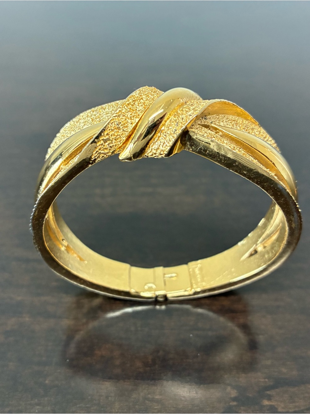 Vintage Trifari Hinged Bangle, Elegant Gold Tone with Knot Design